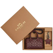 Coach Boxed Mini Rowan Crossbody Bag And Mirror Bag Charm Set In Signature Canvas in Wine Multi CX186