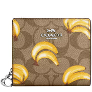 Buy Coach Snap Wallet In Signature Canvas With Banana Print in Khaki/ Dark Saddle CR942 Online in Singapore | PinkOrchard.com